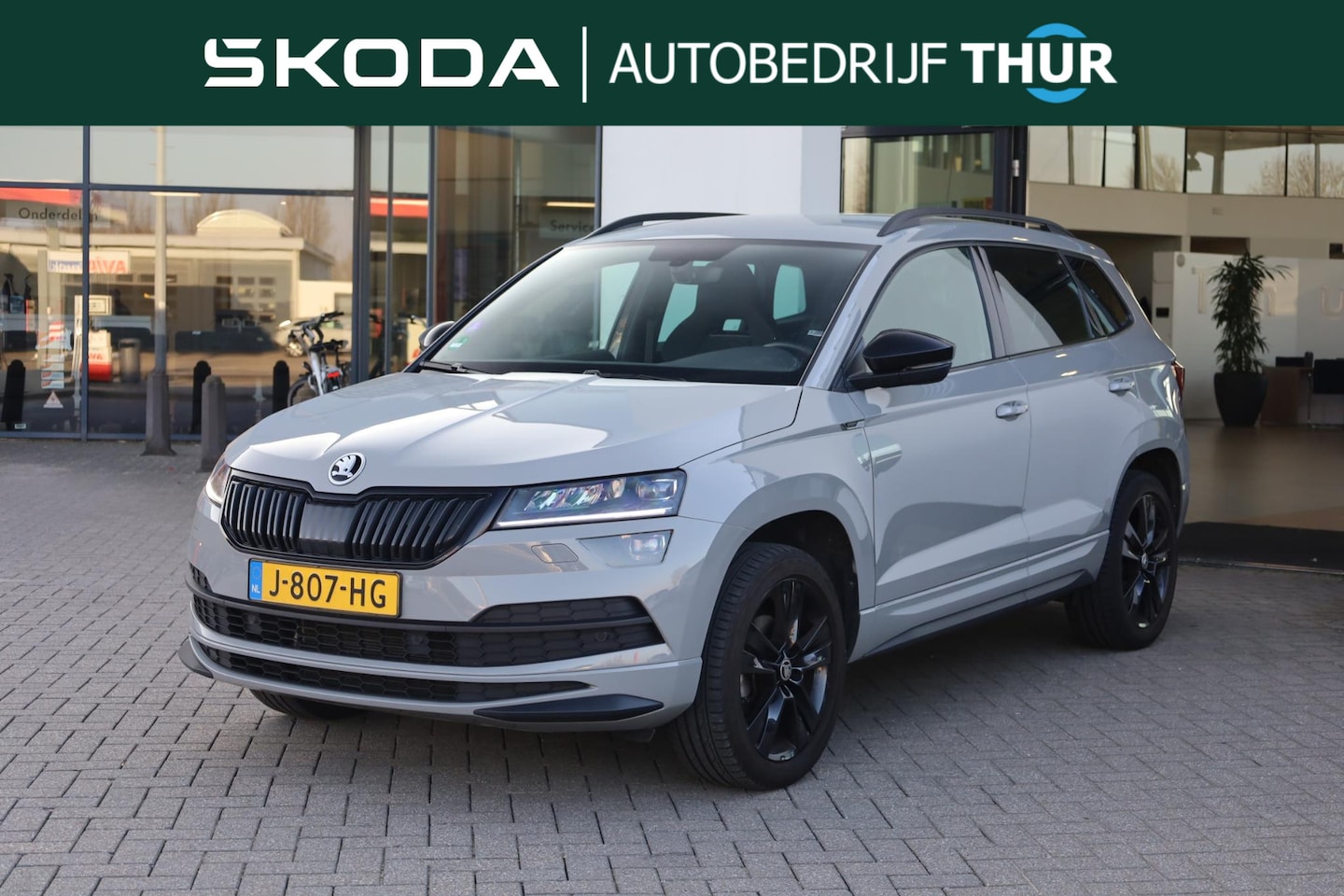 Skoda Karoq - 1.5 TSI ACT Sportline Business NL auto 1e eigenaar nieuw door ons geleverd en onderhouden - AutoWereld.nl