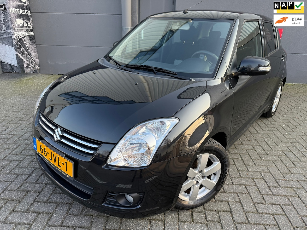 Suzuki Swift - 1.3 Limited*NEW APK*NAP*AIRCO* STOEL VERWARMING - AutoWereld.nl
