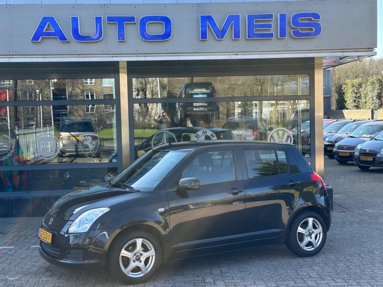 Suzuki Swift - 1.3 BASE Airco - AutoWereld.nl