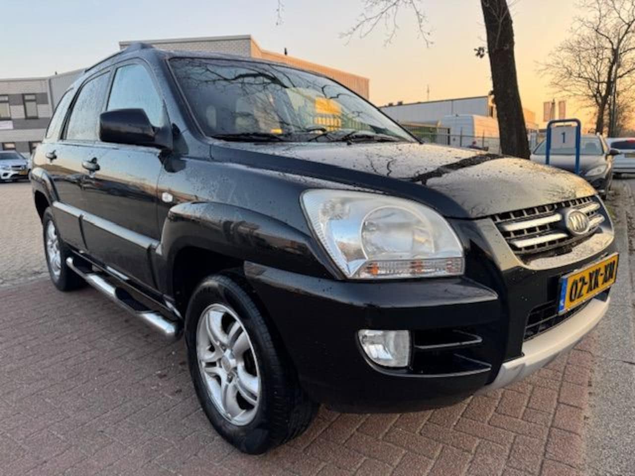 Kia Sportage - 2.0 CVVT Comfort Airco/ECC,Cruisecontrol,Leder Interieur - AutoWereld.nl