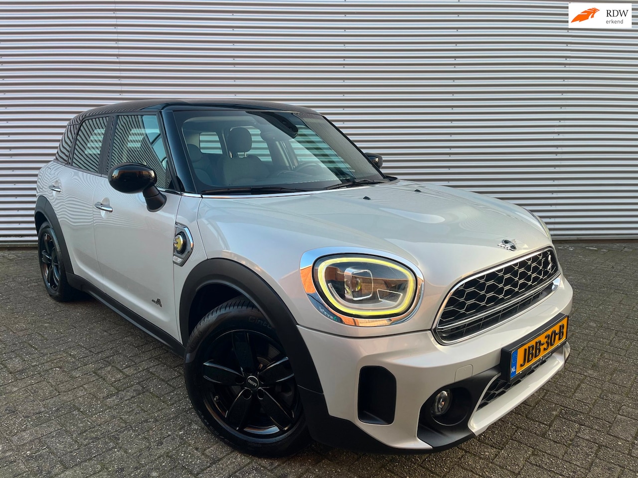 MINI Countryman - Mini 1.5 Cooper S E ALL4 Chili|Carplay|Navi|PDC|Onderhoudhistorie| - AutoWereld.nl