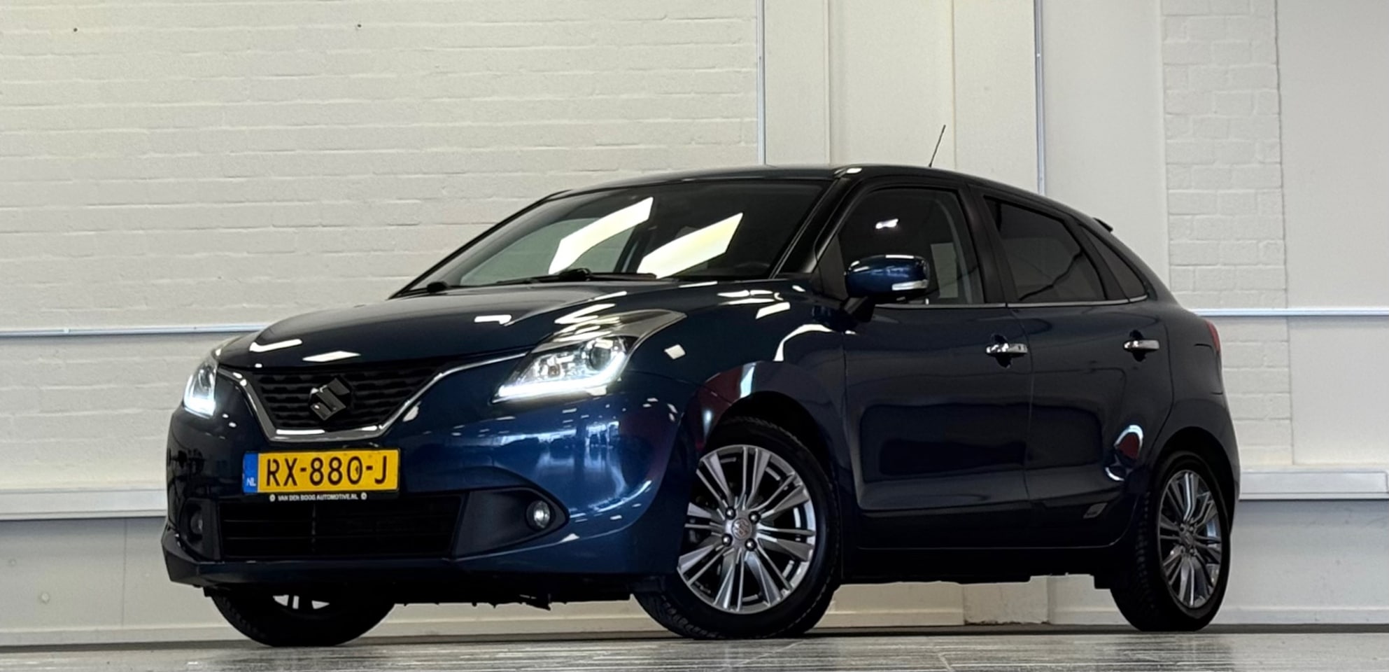 Suzuki Baleno - 1.2 Smart Hybrid High Executive Xenon Camera Allseason banden - AutoWereld.nl
