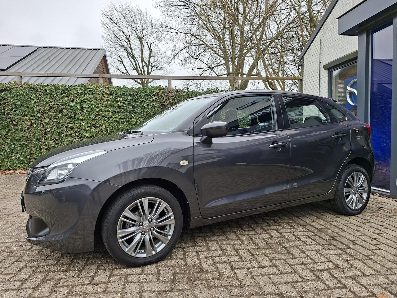 Suzuki Baleno - 1.2 Exclusive Navi, Airco, Trekhaak, Xenon - AutoWereld.nl