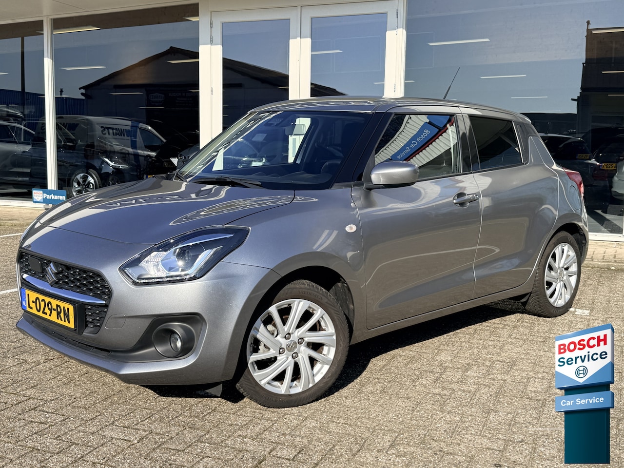 Suzuki Swift - 1.2 Comfort Smart Hybrid | Adapt. Cruise | Apple/Android | Airco | Navi | PDC | Camera - AutoWereld.nl