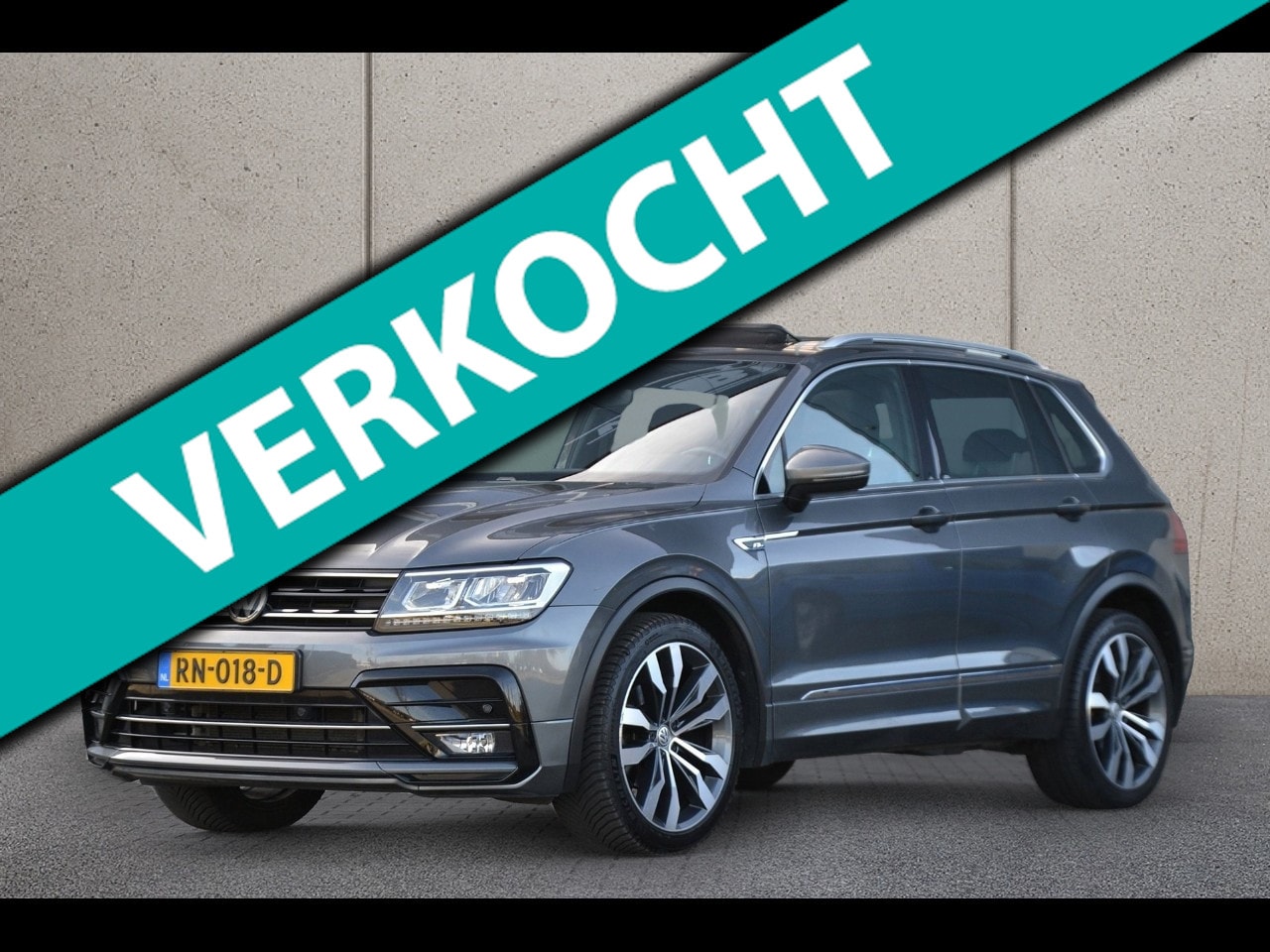Volkswagen Tiguan - 1.4 TSI 125PK R-Line | Panoramadak | Trekhaak | Winterpakket - AutoWereld.nl
