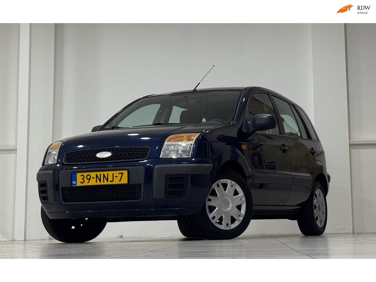 Ford Fusion - 1.4i 16V Cool & Sound 3e Eigenaar APK 11-11-2026 Garantie - AutoWereld.nl