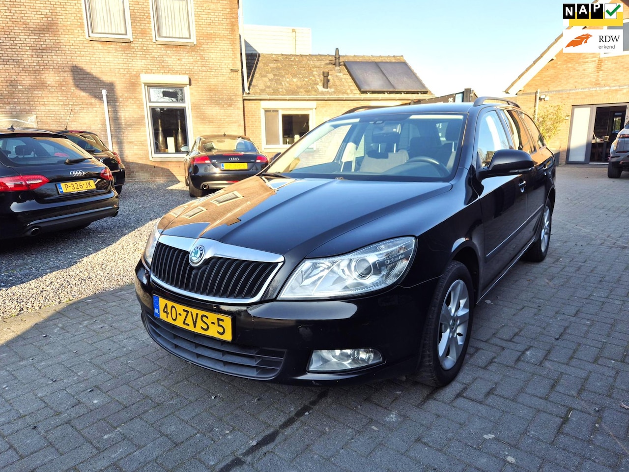 Skoda Octavia Combi - 1.4 TSI Green Arctic Navi Clima Cruise Trekhaak - AutoWereld.nl