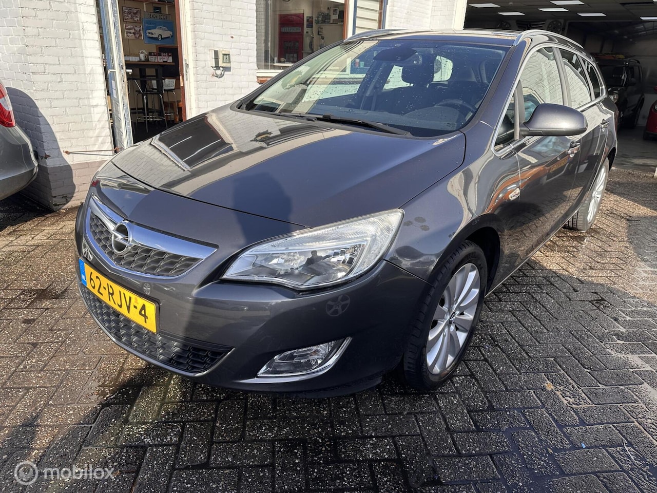 Opel Astra Sports Tourer - 1.4 Turbo Cosmo 1.4 Turbo Cosmo - AutoWereld.nl