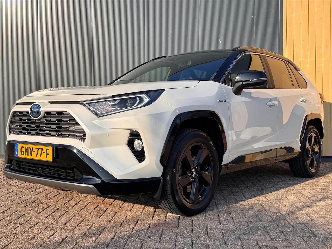 Toyota RAV4 - 2.5 Hybrid 222pk CVT AWD Bi-Tone | Trekhaak | Stoelverwarming | Camera | Carplay | Navi | - AutoWereld.nl