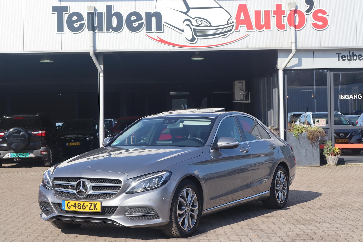 Mercedes-Benz C-klasse - 180 Prestige Schuif- kanteldak, Cruise control, Navigatie, Lichtmetalen wielen. Stoelverwa - AutoWereld.nl