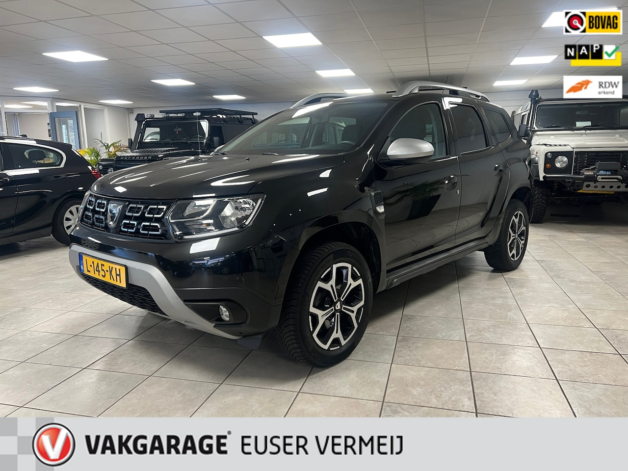Dacia Duster - 1.3 TCe Prestige Lederen bekleding, Climate controle, Trekhaak, Cruise controle. - AutoWereld.nl