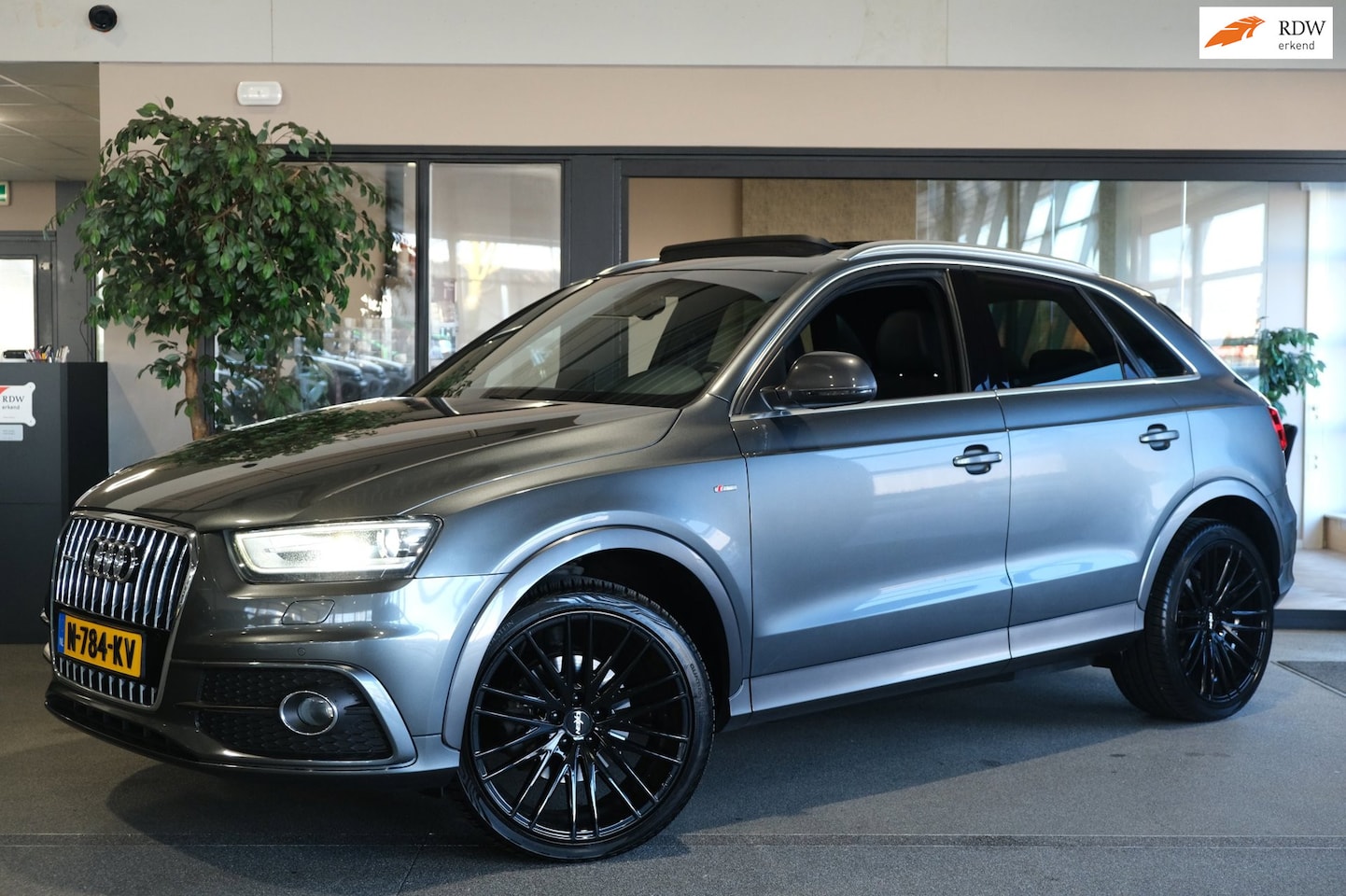 Audi Q3 - 2.0 TFSI quattro 2x S-Line Pano Trekhaak Cruise Navi Full - AutoWereld.nl