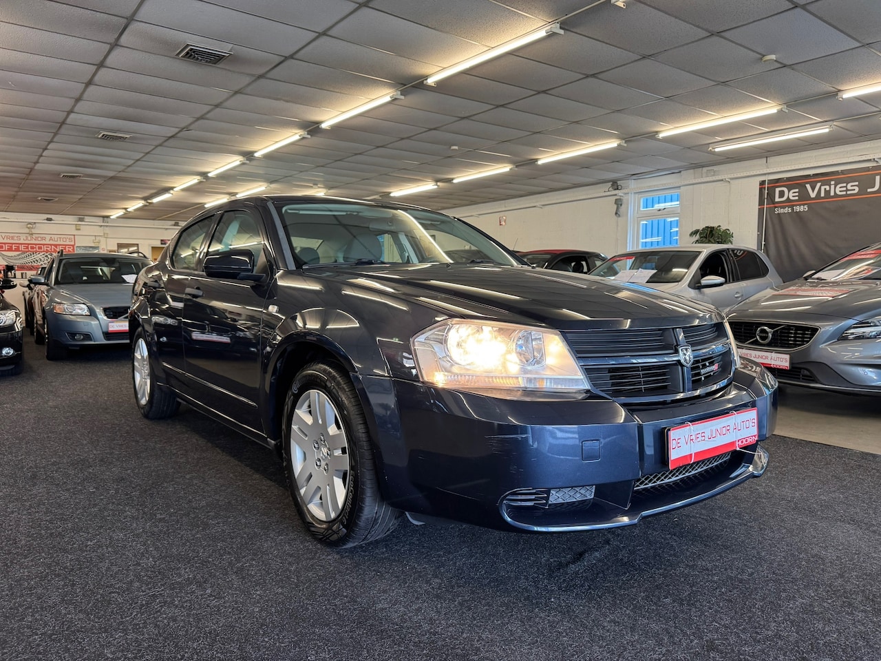 Dodge Avenger - 2.0 SE Business Edition. Goed onderhouden, BT, cruise control, airco en meer! - AutoWereld.nl