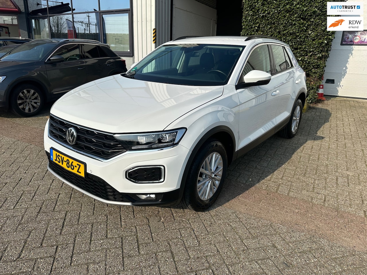 Volkswagen T-Roc - 1.5 TSI Sport 1.5 TSI Sport - AutoWereld.nl