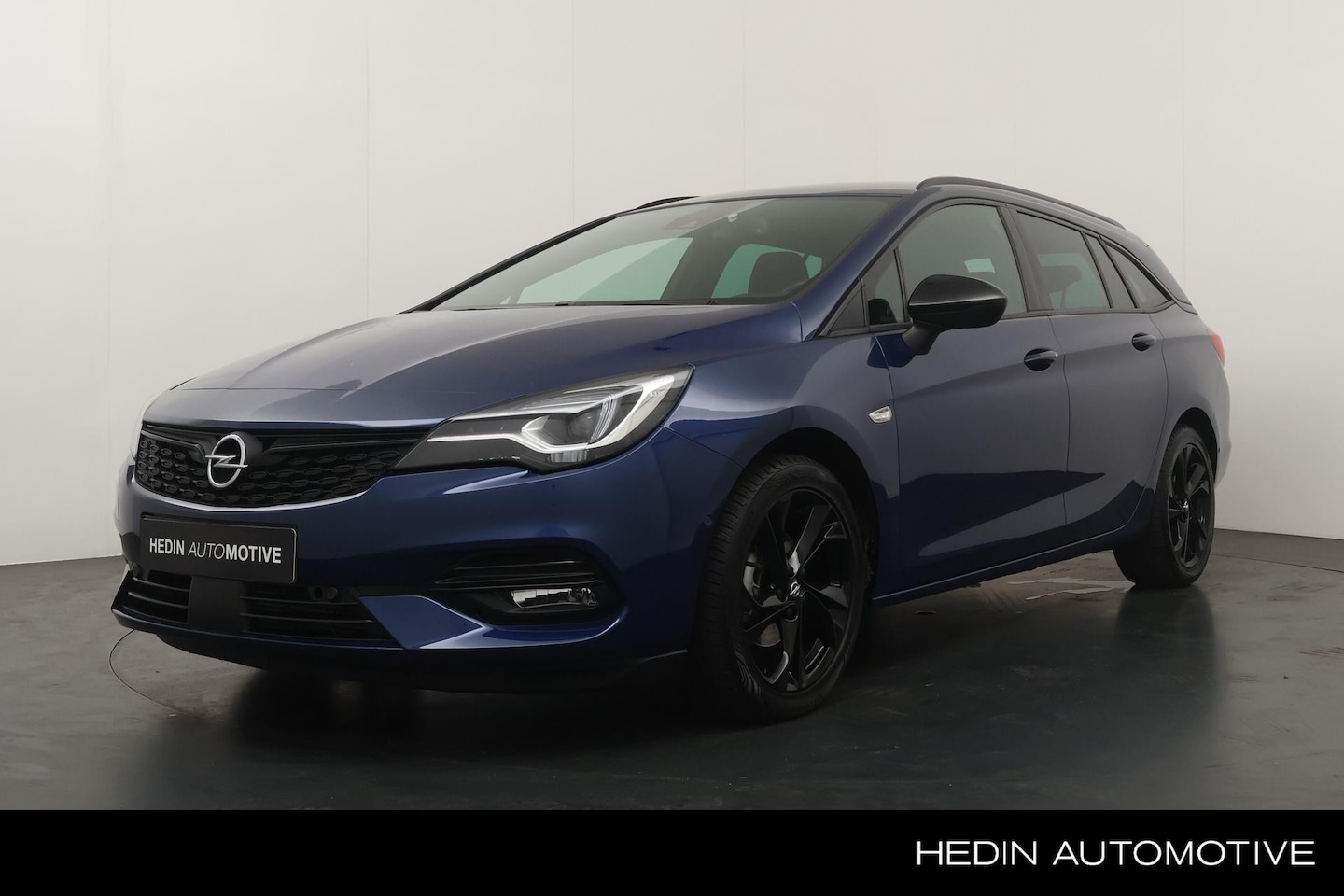 Opel Astra Sports Tourer - 1.4 145pk Ultimate Automaat | Trekhaak | Stuur+Stoelverwarming | Parkeer Camera | AGR Stoe - AutoWereld.nl