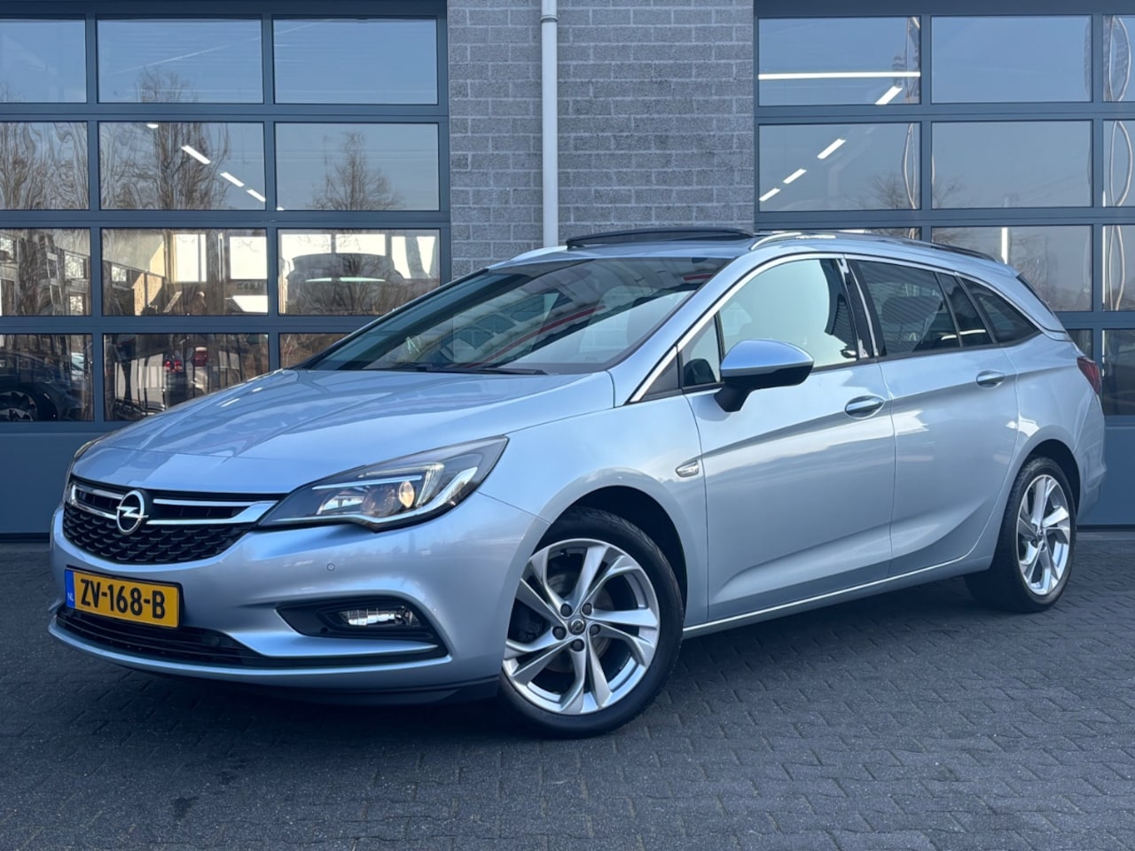 Opel Astra Sports Tourer - 1.4 Turbo Business Executive |SCHUIFDAK|TREKHAAK| - AutoWereld.nl
