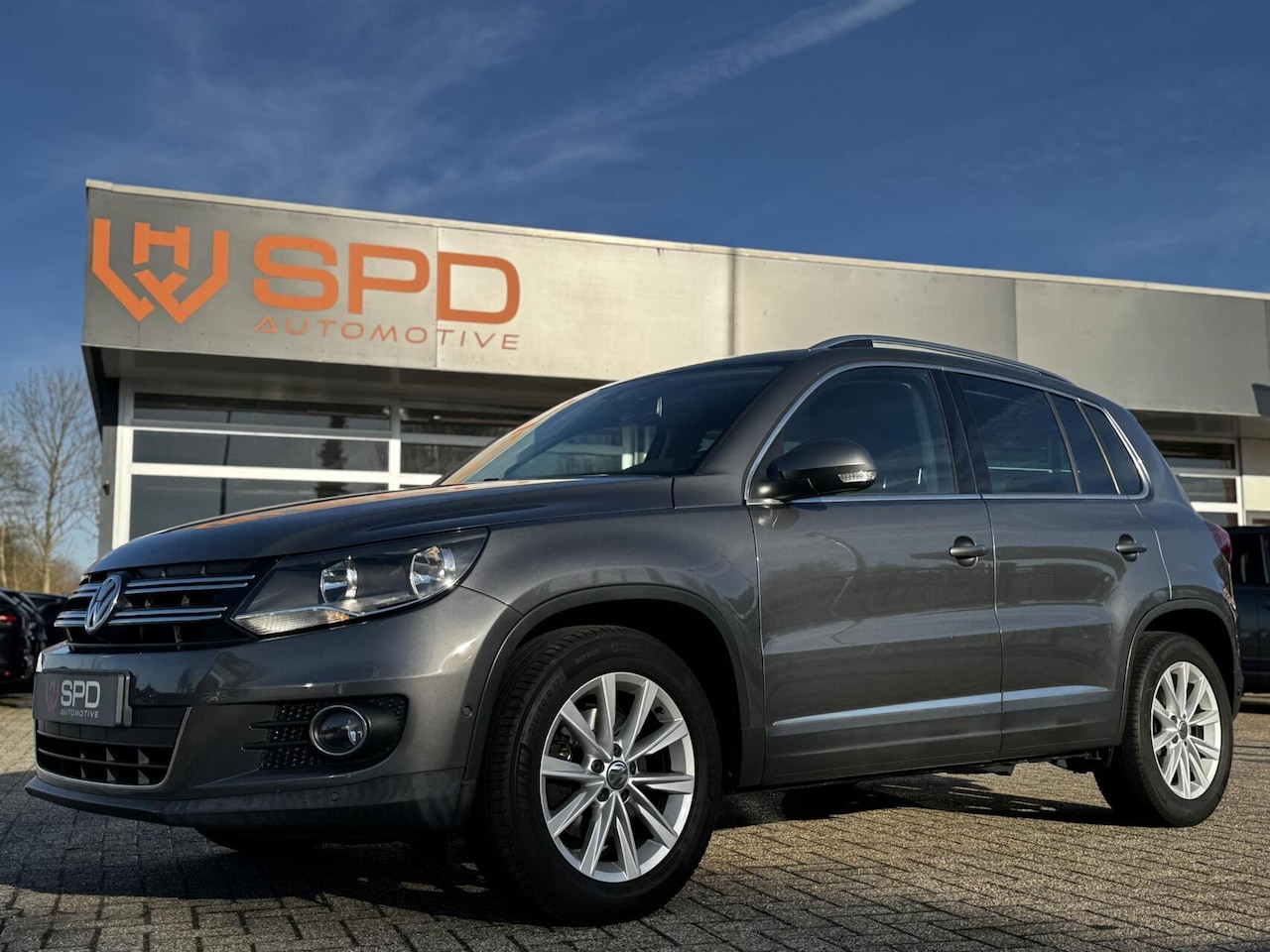 Volkswagen Tiguan - 1.4 TSI Sport&Style|Navi|Clima|PDC|Cruise - AutoWereld.nl