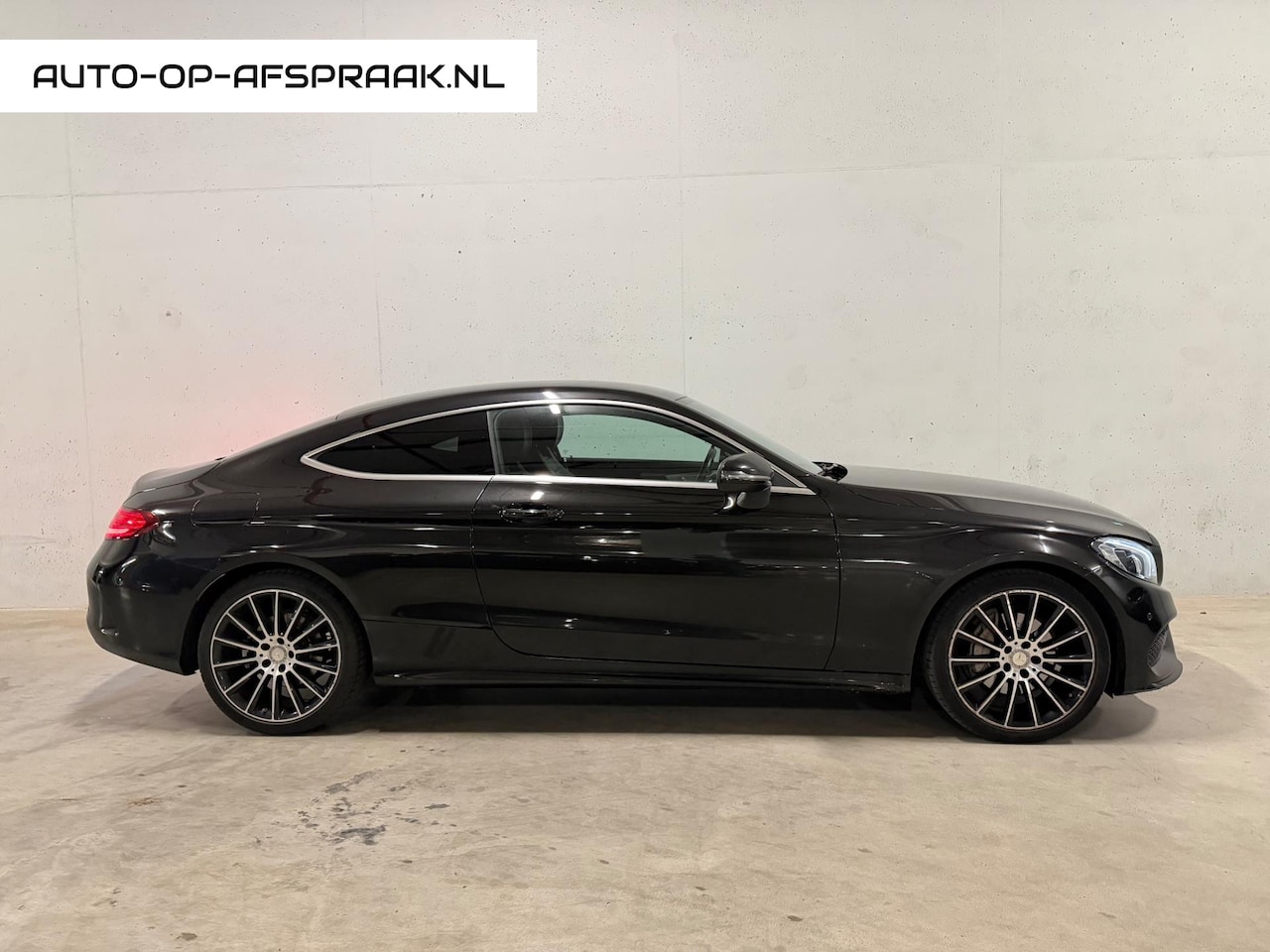 Mercedes-Benz C-klasse Coupé - 200 AMG Leer Navi Memory Stoelverwarming - AutoWereld.nl