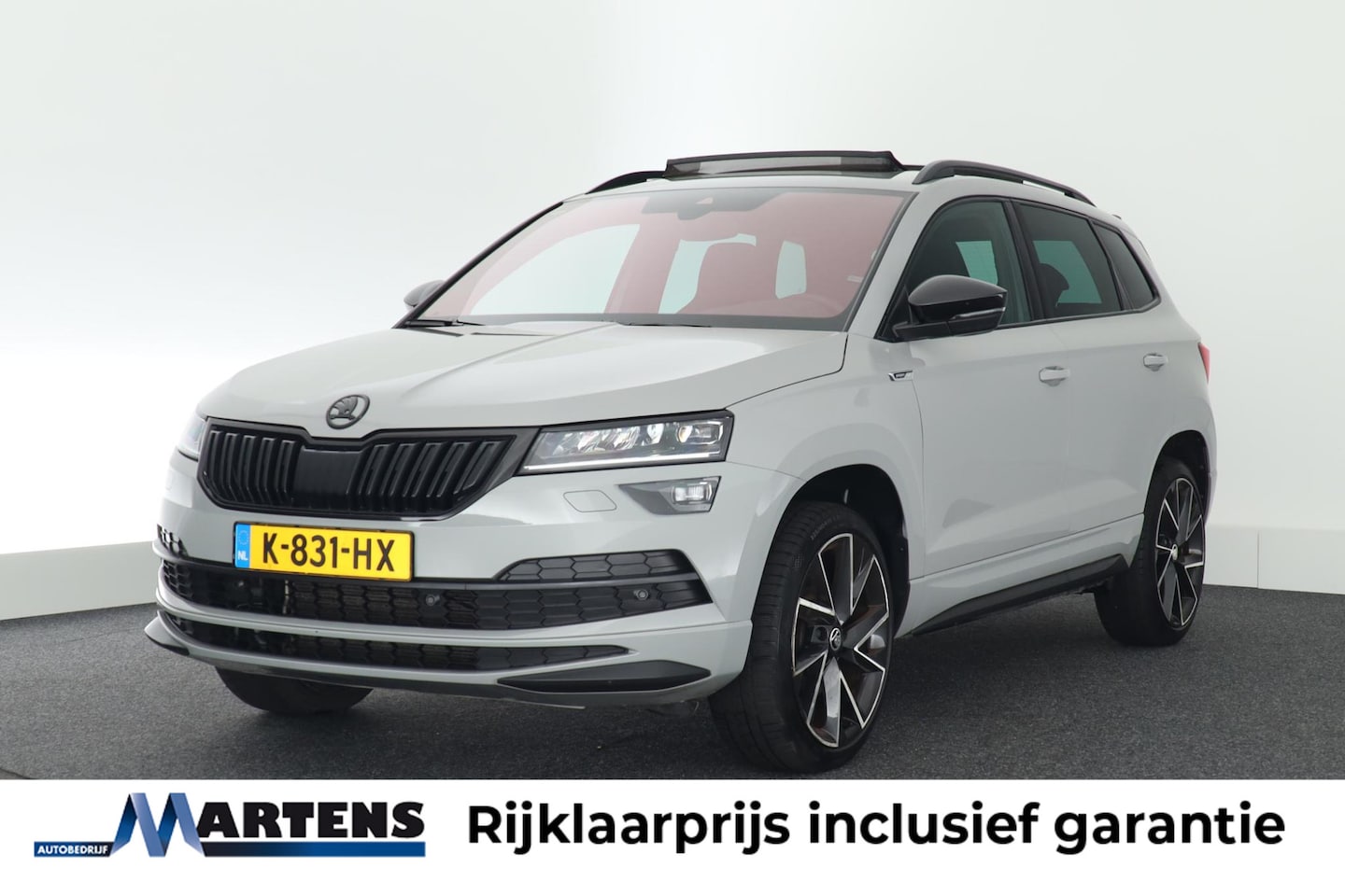 Skoda Karoq - 1.5 TSI 150pk DSG ACT Sportline Business Trekhaak Camera Canton Keyless Virtual Cockpit St - AutoWereld.nl