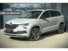 Skoda Karoq - 1.5 TSI ACT Sportline Business | Panoramadak | Stoelverwarming | Stuurverwarming | Canton