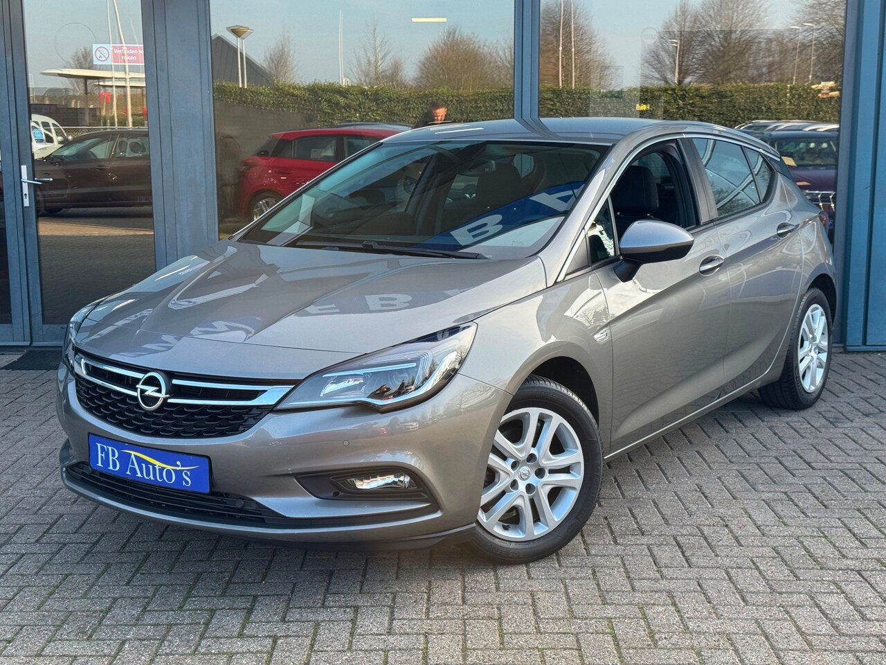 Opel Astra - 1.4 Edition Airco Navi Cruise - AutoWereld.nl