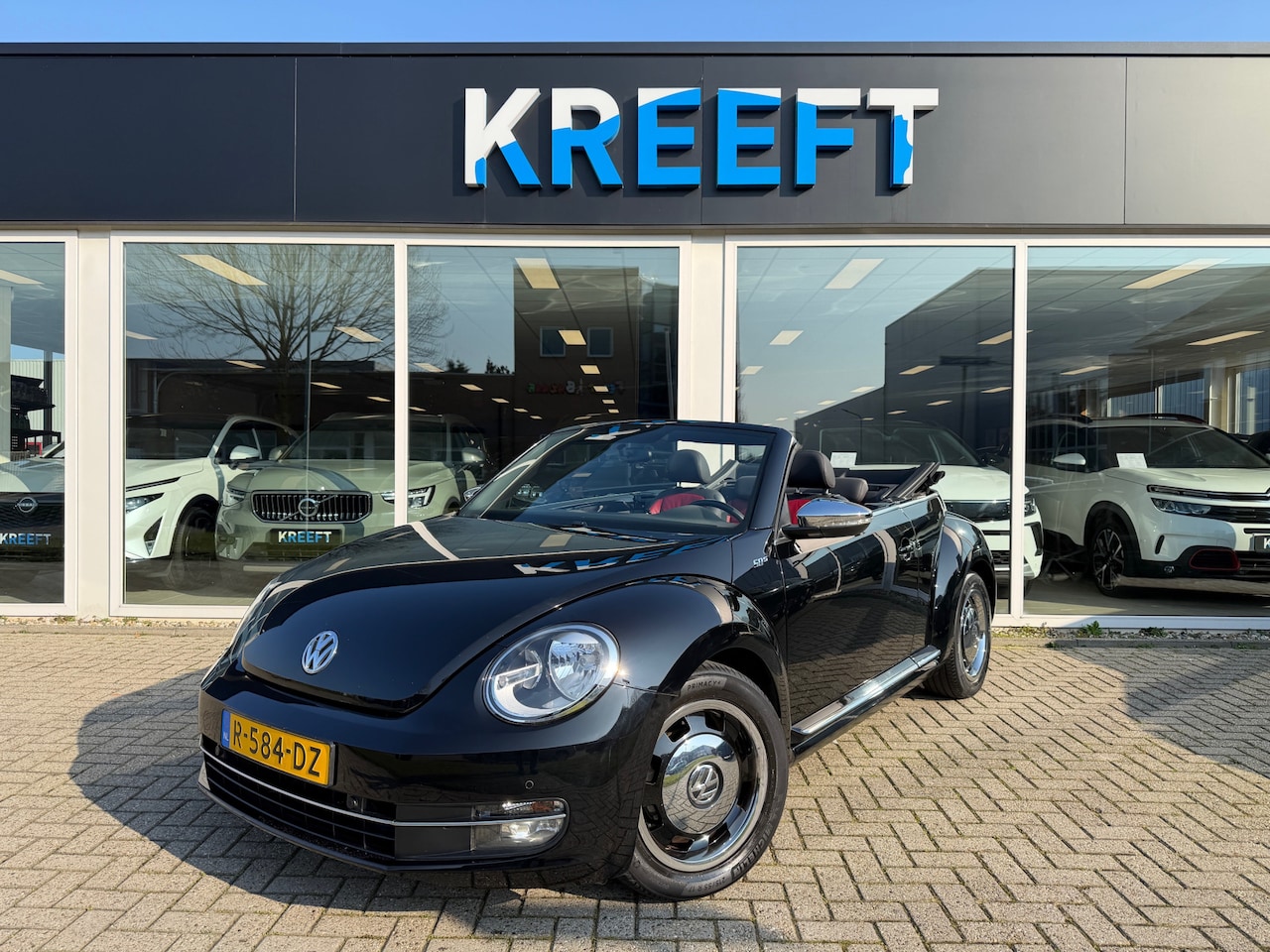 Volkswagen Beetle Cabriolet - 1.2 TSI Design BlueMotion Speciale Editie - AutoWereld.nl