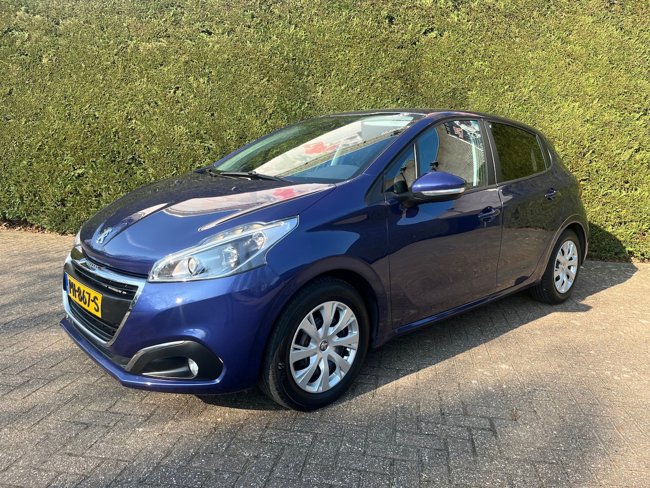 Peugeot 208 - 1.2 Apple carplay, PDC, Navigatie, Cruisecontrole, Eerste eigenaar. - AutoWereld.nl