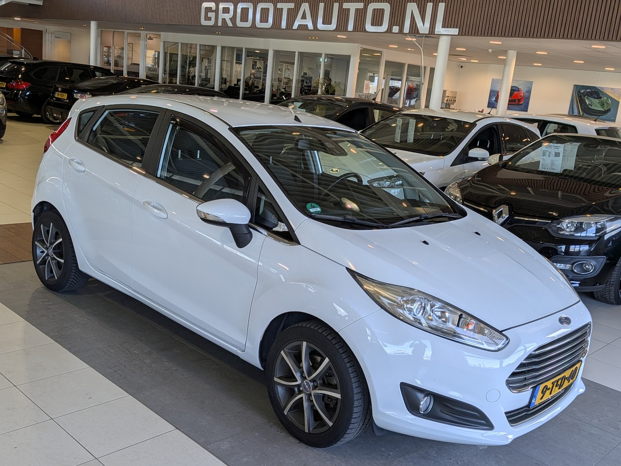 Ford Fiesta - 1.0 EcoBoost Titanium NAP, Airco, Cruise Control, Trekhaak, Stuurbekrachtiging - AutoWereld.nl