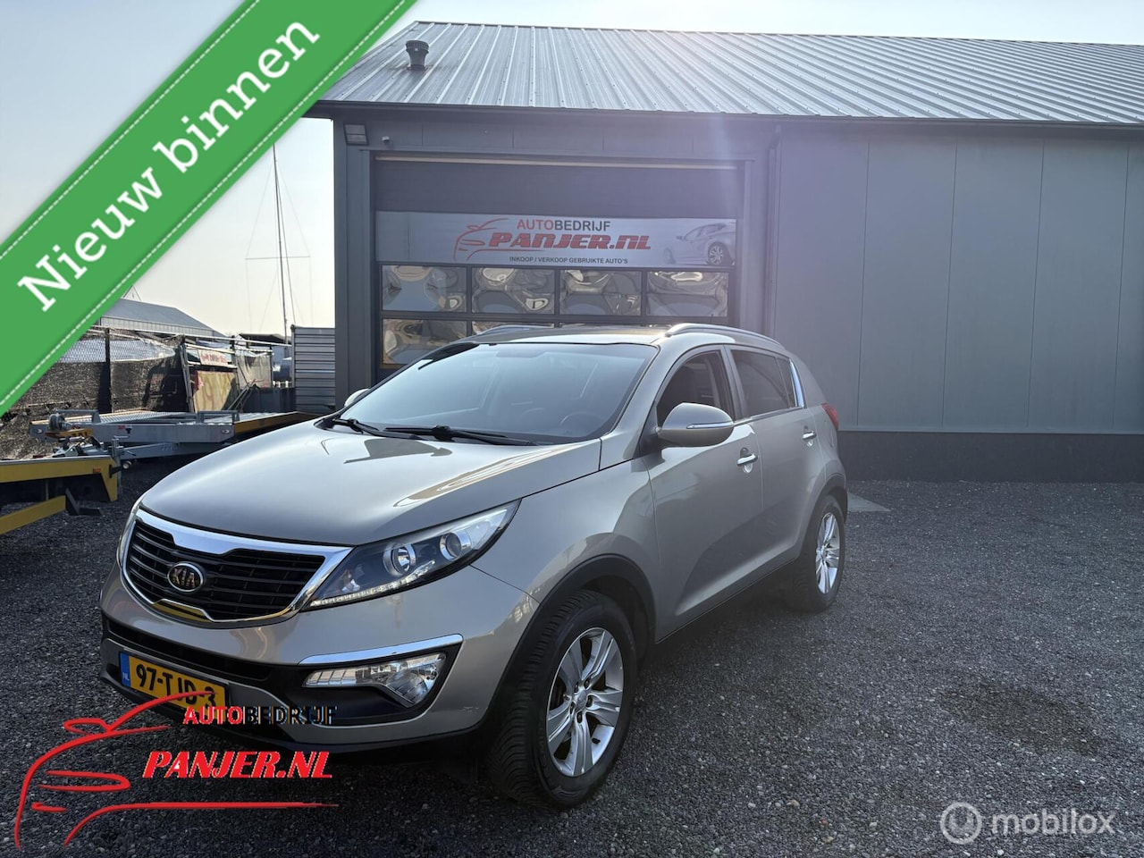 Kia Sportage - 1.6 GDI "NAVI+LEER+TREKHAAK+LED+LMV" - AutoWereld.nl