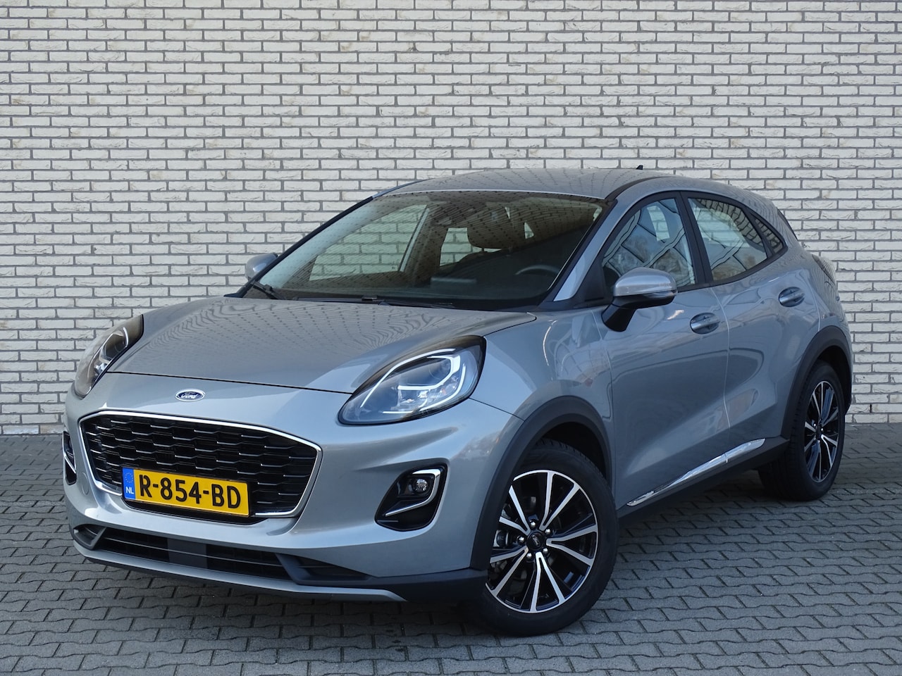 Ford Puma - 1.0 Turbo 125pk Mild Hybride Titanium Automaat | Cruise. | Winterpack | Trekhaak | Eerste - AutoWereld.nl