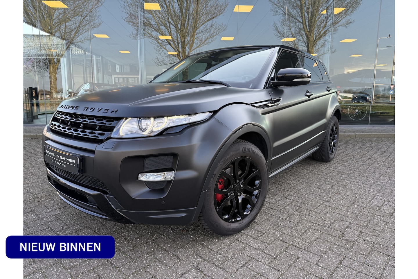 Land Rover Range Rover Evoque - 2.0 Si 4WD (241pk) Prestige Aut ** Panodak ** Leder ** Memory ** Navigatie ** Full Carwrap - AutoWereld.nl
