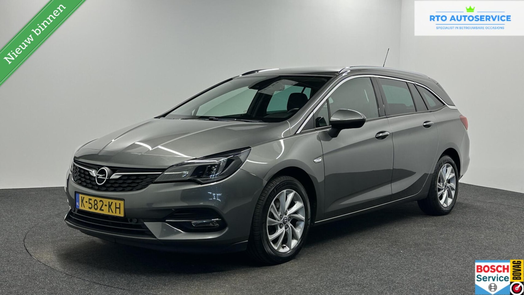 Opel Astra Sports Tourer - 1.2 Business Elegance TREKHAAK CAMERA CARPLAY ECC NAVI CRUISE LM. - AutoWereld.nl