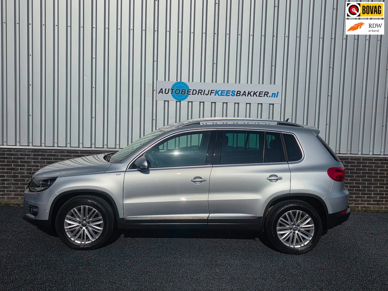 Volkswagen Tiguan - 1.4 TSI Sport&Style, Trekhaak, Cruisecontrole - AutoWereld.nl
