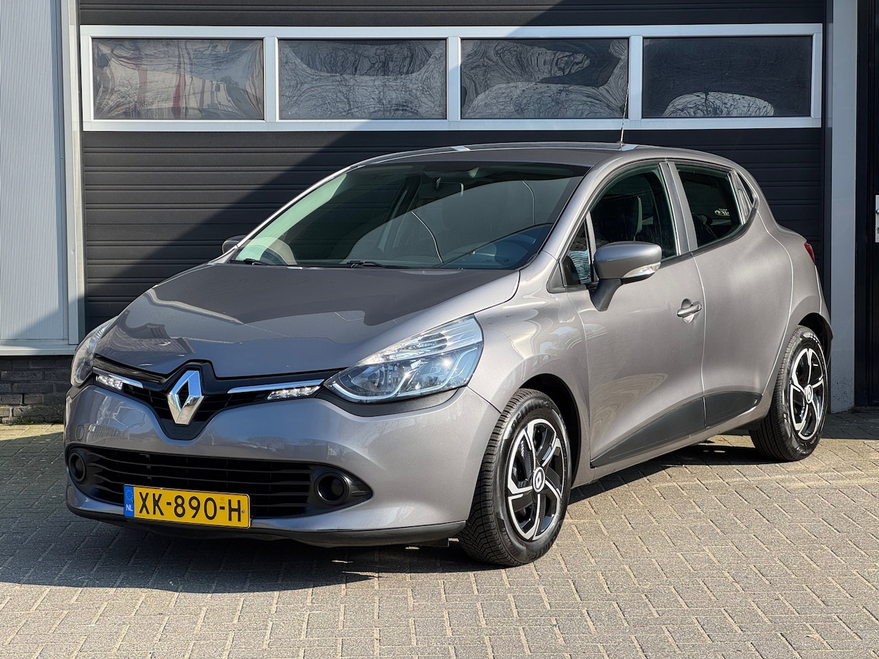 Renault Clio - 1.2 Collection Navi, Cruise, Airco - AutoWereld.nl