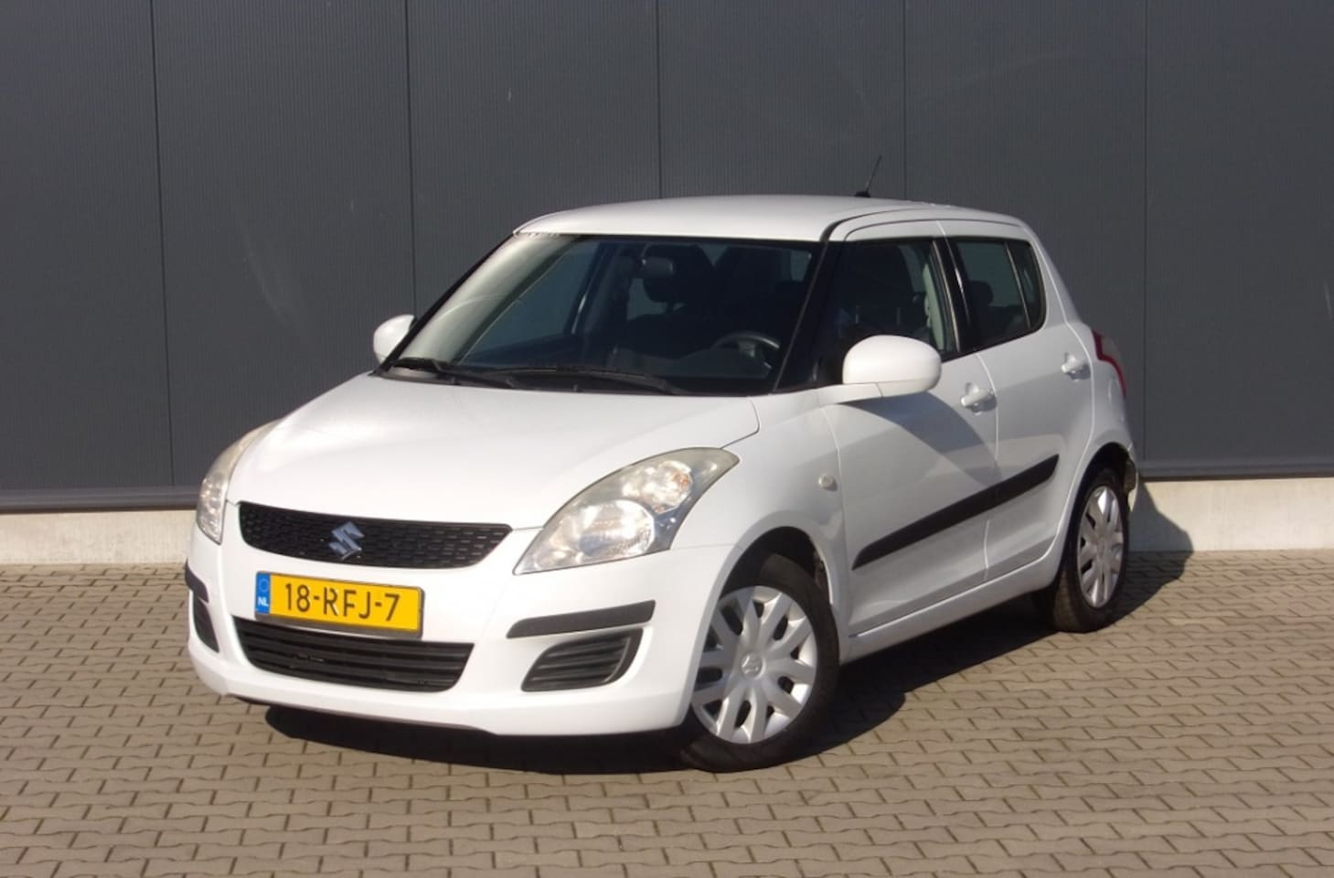 Suzuki Swift - 1.2 Comfort | 1e eigenaar | NL auto | 5 deurs - AutoWereld.nl