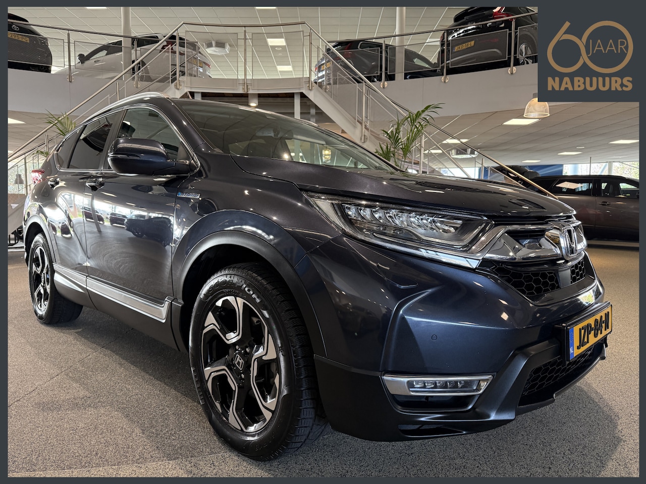 Honda CR-V - 2.0 Hybrid AWD Executive 2.0 Hybrid AWD Executive, Trekhaak, Camera, Pano, Leder, HUD - AutoWereld.nl