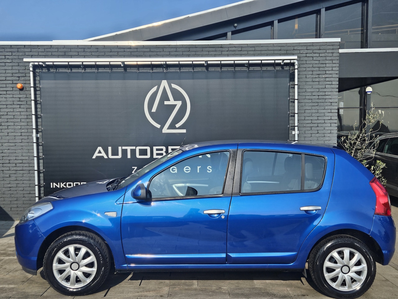 Dacia Sandero - 1.2 Lauréate *AC**Exclusive-pakket* - AutoWereld.nl