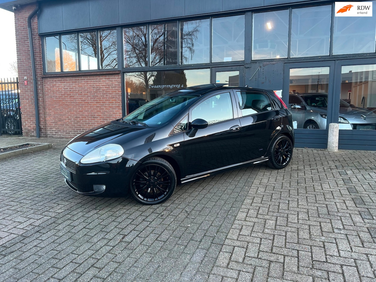 Fiat Grande Punto - 1.4-16V Turbo, 120pk, Sport Cruise control, Pano - AutoWereld.nl