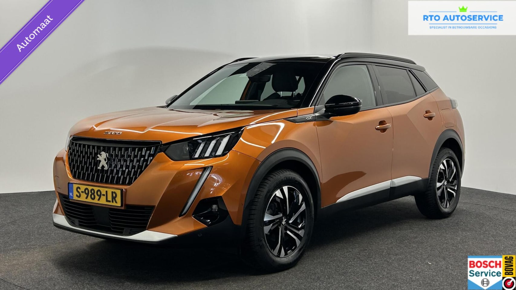 Peugeot 2008 - 1.2 PureTech Blue lease Allure CAMERA CARPLAY NAVI LM ECC CRUISE. - AutoWereld.nl