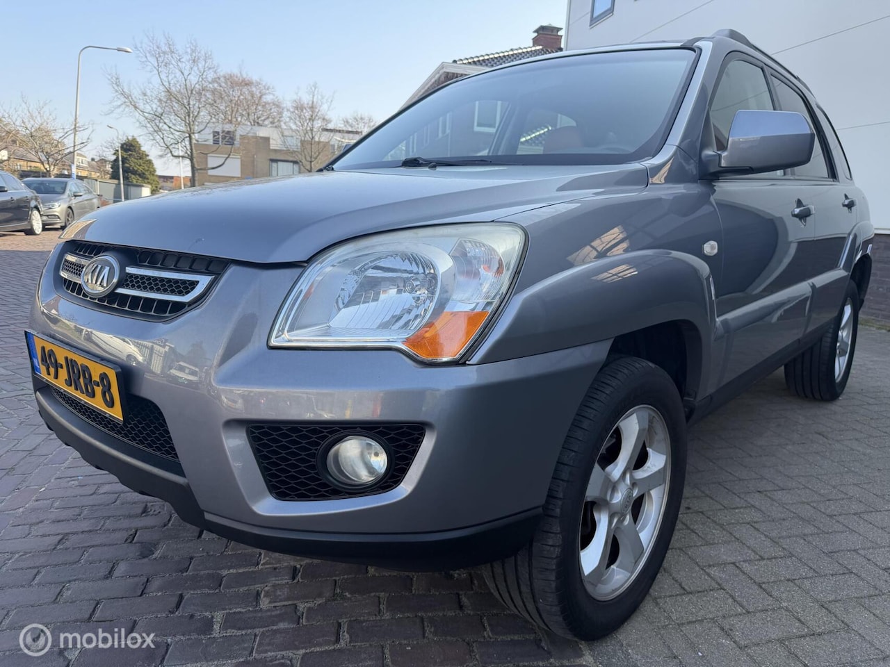 Kia Sportage - 2.0 CVVT X-clusive 2.0 CVVT X-clusive - AutoWereld.nl