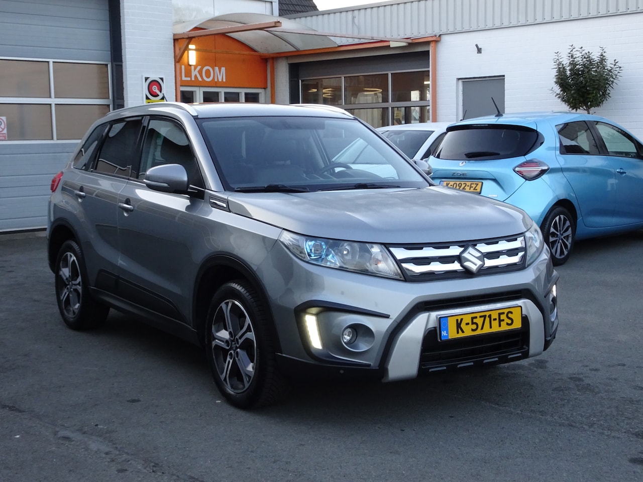 Suzuki Vitara - 1.6 High Executive Automatische airco, navigatie, panorama dak, parkeersensoren, licht met - AutoWereld.nl