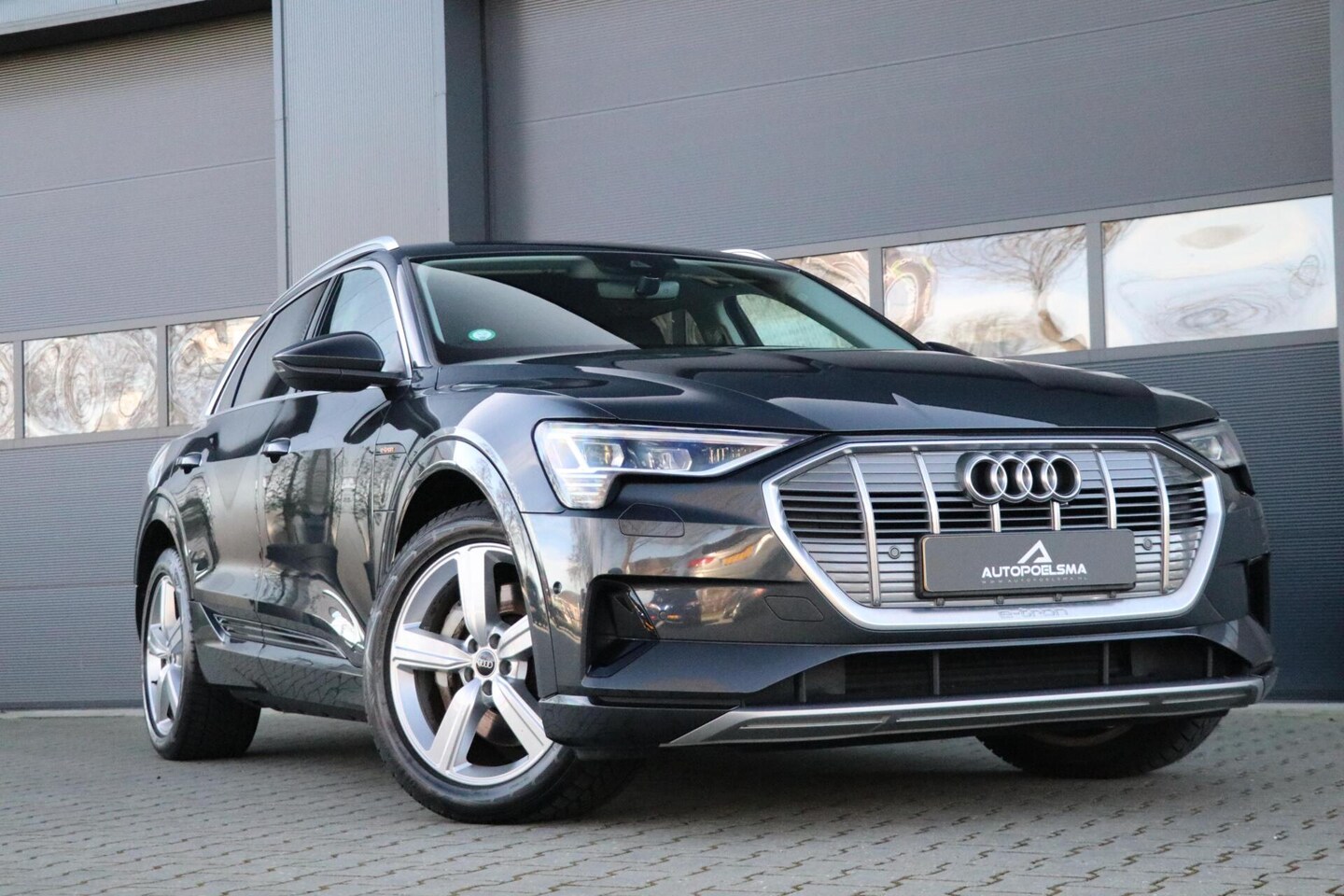 Audi e-tron - 55 quattro Business edition Plus 95 kWh Luchtvering AppleCarplay Lmv Chroom - AutoWereld.nl