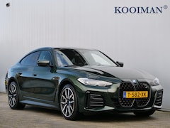 BMW i4 - eDrive35 High Executive 70 kWh 286 Pk Automaat M-Sport / Navi / DAB / Leer / Camera / Appl