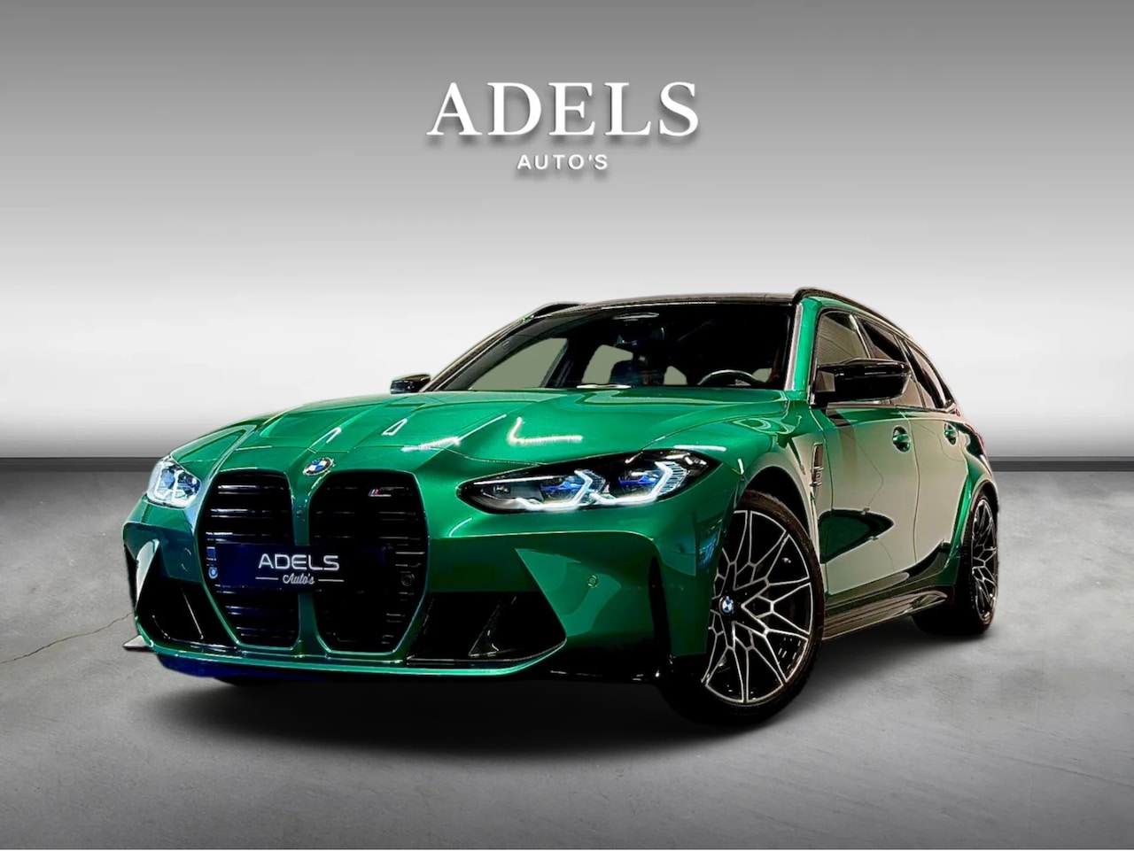 BMW 3-serie Touring - M3 xDrive Competition Schaalstoelen Carbon Isle of Man Green - AutoWereld.nl