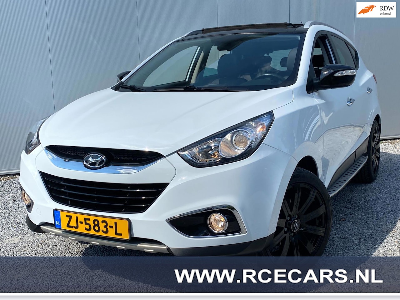 Hyundai ix35 - 2.0i 4WD i-Catcher Pano Opendak Leder Cruise clima camera 4xstoelverw Navi - AutoWereld.nl
