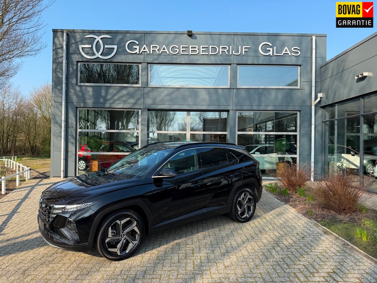 Hyundai Tucson - 1.6 T-GDI HEV Premium 4wd leer- stoel/stuurverw. - AutoWereld.nl