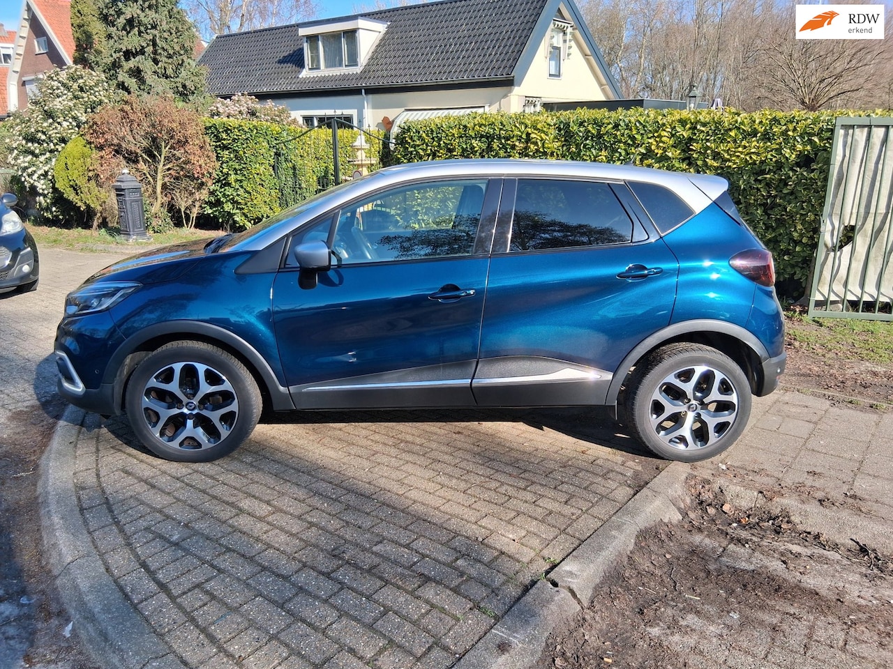 Renault Captur - 0.9 TCe Intens airco navigatie trekhhaak - AutoWereld.nl