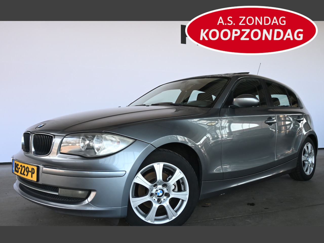 BMW 1-serie - 116i Introduction Airco Navigatie Schuifdak All in Prijs! Inruil Mogelijk! - AutoWereld.nl