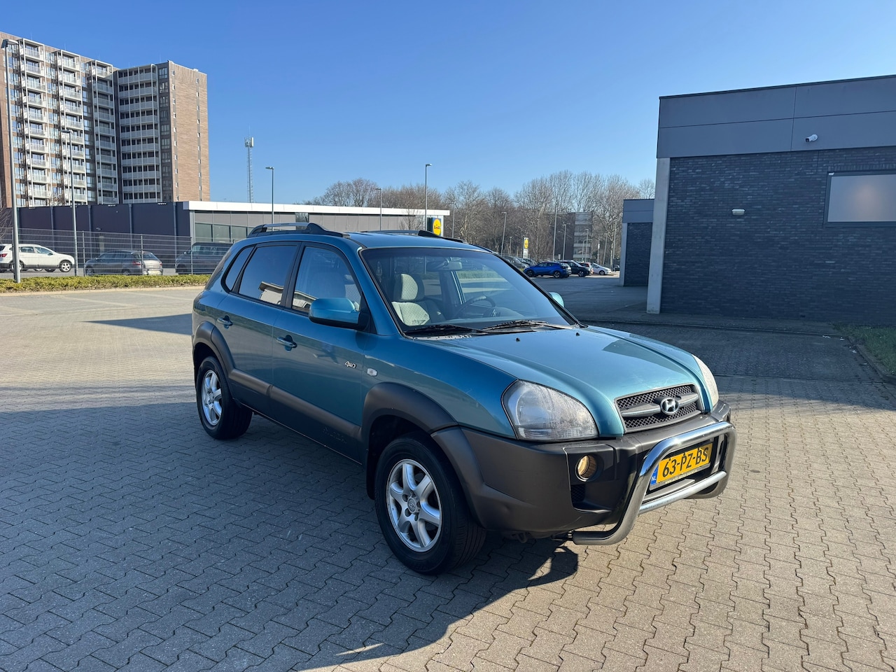 Hyundai Tucson - 2.0i 4WD Style. 4X4 - AutoWereld.nl