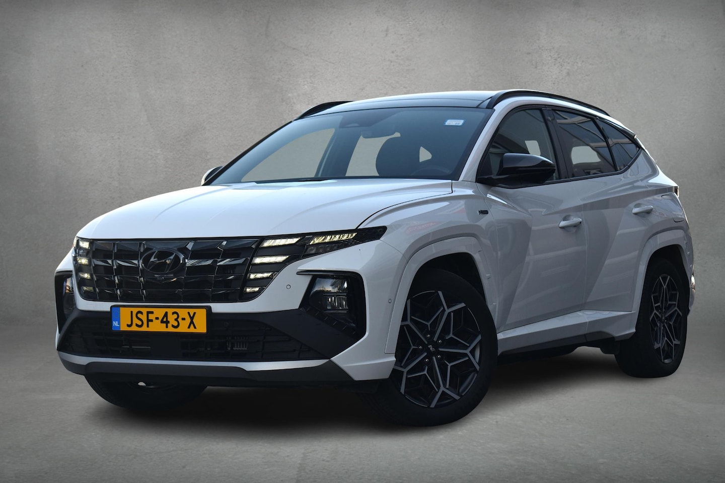 Hyundai Tucson - 1.6 T-GDI PHEV Premium Sky 4WD | Pano | Leer | Memory | 360 Camera - AutoWereld.nl